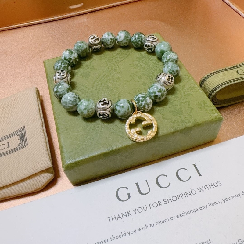 G*u*i bracelets